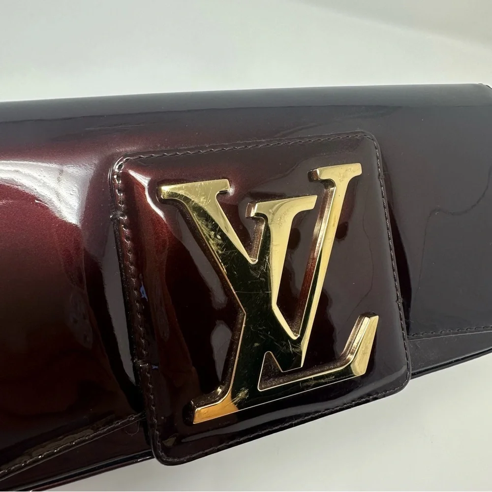 Louis Vuitton Dark Burgundy Clutch with Gold Logo